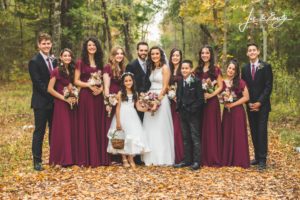 bride and groom with siblings