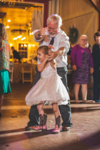 man dancing with little girl