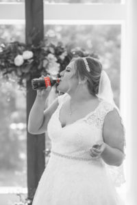 Bride drinking coke
