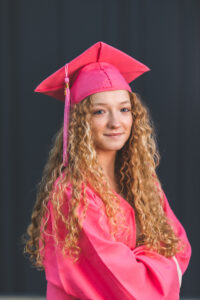 Girl in graduation cap and gown