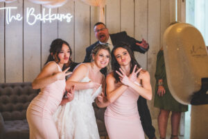 Bridesmaids and Bride in photo booth