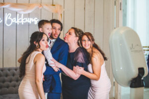 Guests making silly faces in photo booth